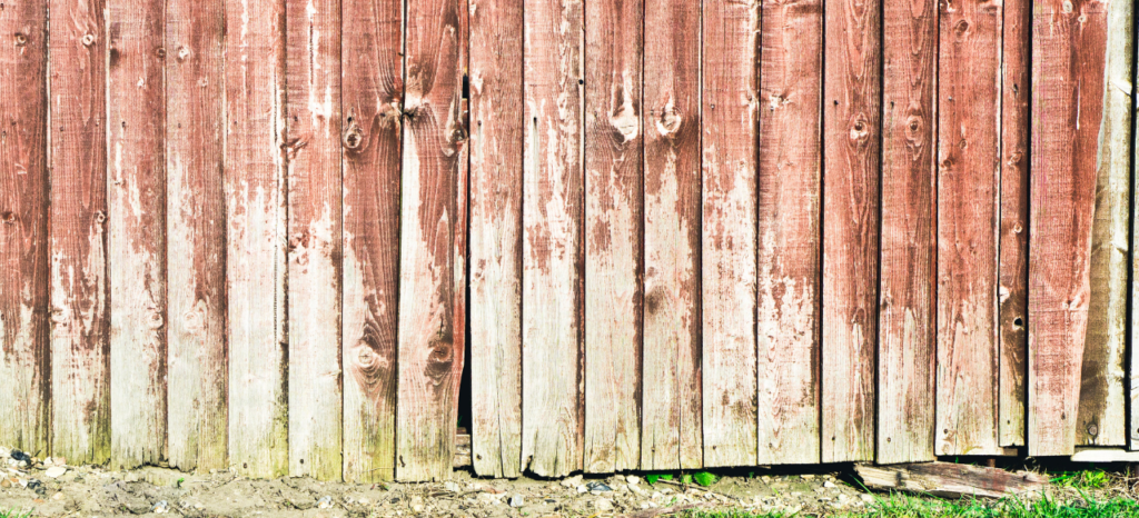 discoloured peeling timber fence penrith