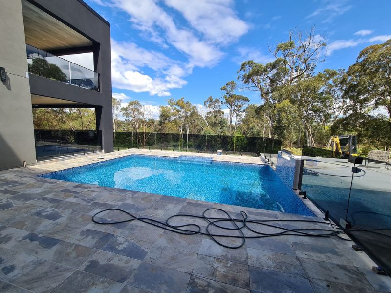 pool fence installation with glass