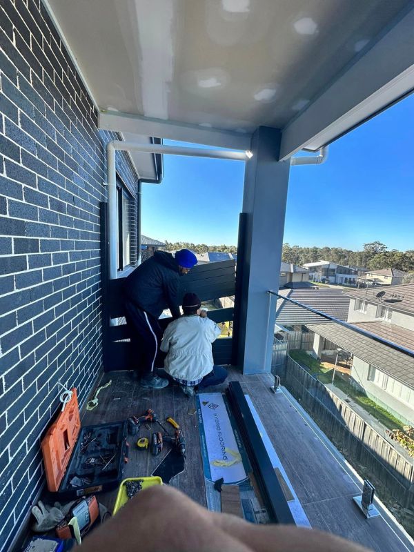 progress photo of installing a balcony balustrade